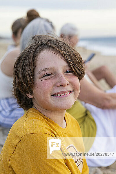 Mexico  Baja  Pescadero  Portrait of smiling boy on beach