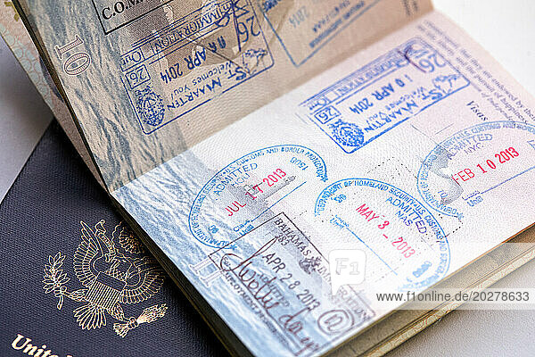 Studio shot of US passports with stamps
