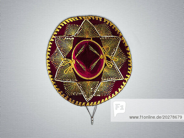 Overhead view of Mexican sombrero against white background