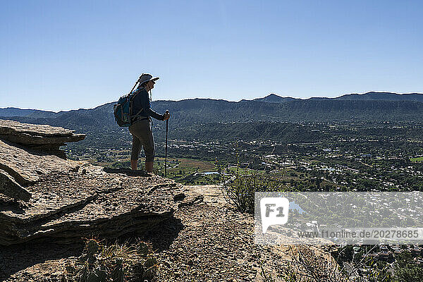 Usa  Colorado  Durango  Woman standing on ledge in San Juan Mountains
