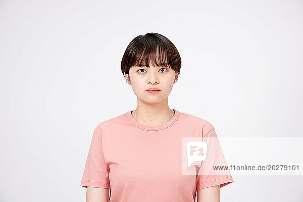 A woman in a pink shirt