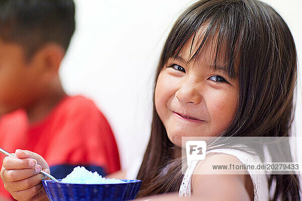 Kid eating shaved ice