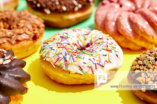Donuts on a yellow and green background