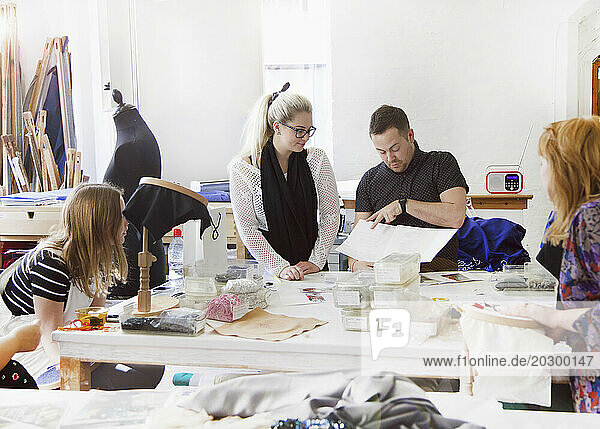 Design Professionals Working at Embroidery Studio