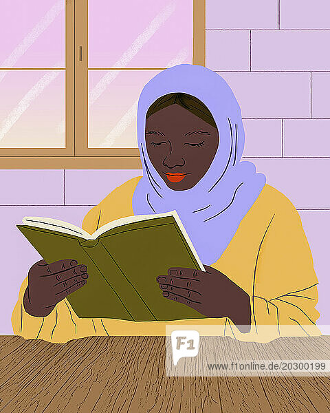 Muslim woman in hijab reading book at table