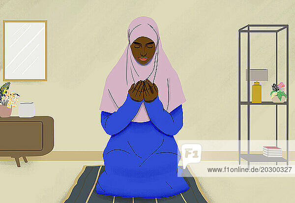 Muslim woman praying on mat in living room at home