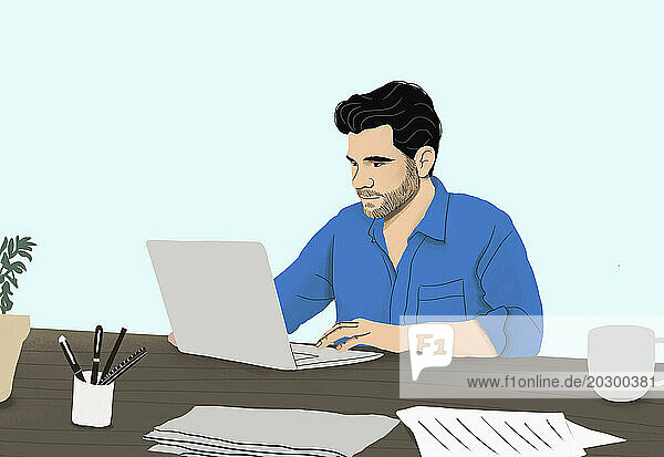 Man working from home at laptop in dining room