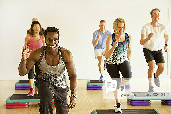 Group of People at Step Aerobics Class