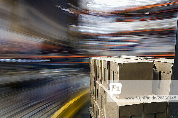 Boxes on Forklift in Warehouse