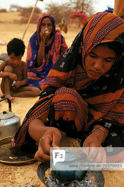 A nomadic family relaxes in a Tuareg nomad camp near Timbuktu  West Africa.