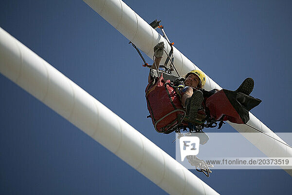 A man working on the maintenance of the world's longest cable-stayed suspended deck bridge near Patras  Greece.