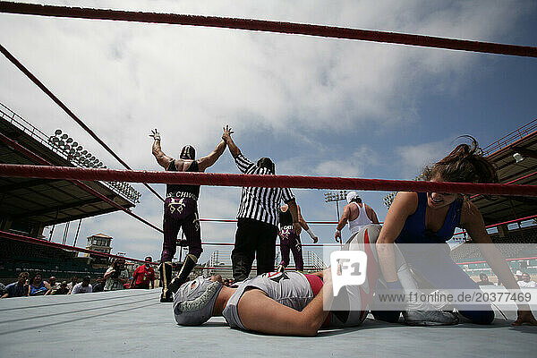 Mexican Lucha Libre wrestlers fight at the Del Mar County Fair  San Diego  California.