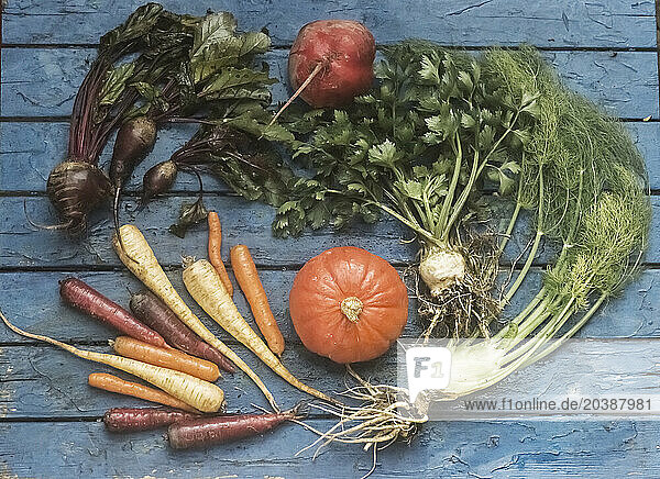 Vegetables flat laid on wooden surface