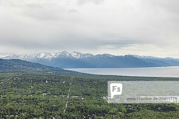 Aerial view of the city of Anchorage on a cloudy summer evening