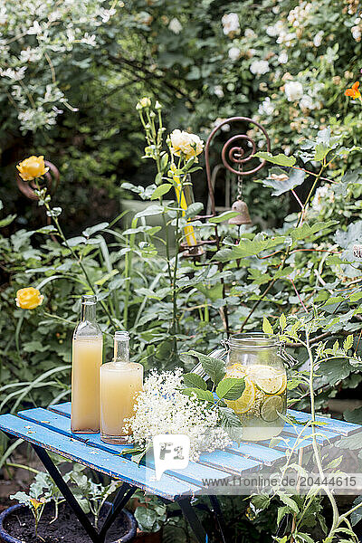Austria Â SalzburgerÂ Land Â AltenmarktÂ imÂ Pongau Â Homemade drinks on table in summer garden