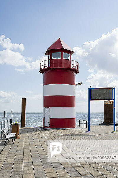 Germany  Schleswig-Holstein  Wyk  Small red lighthouse at harbor
