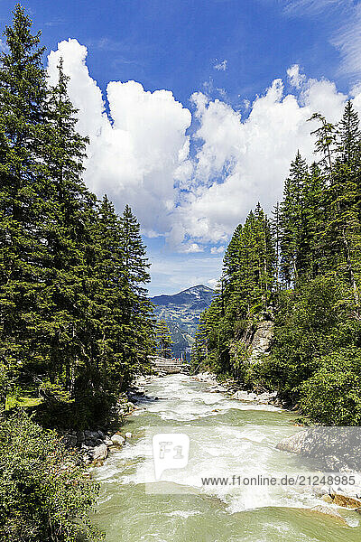 Scenic view of the Krimmler Ache river and Upper Fall lookout of Krimml Waterfalls in Hohe Tauern National Park  Salzburg Province  Austria.