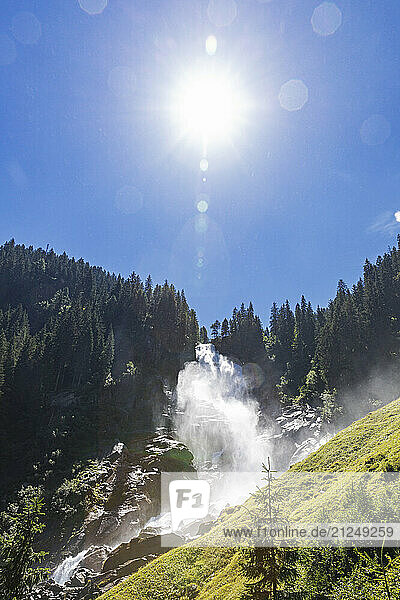 Upper Fall of Krimml Waterfalls in Hohe Tauern National Park  Austria on a sunny day.