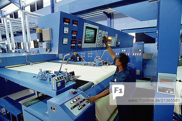 Indonesia. Industry. Towel factory weaving machine operators