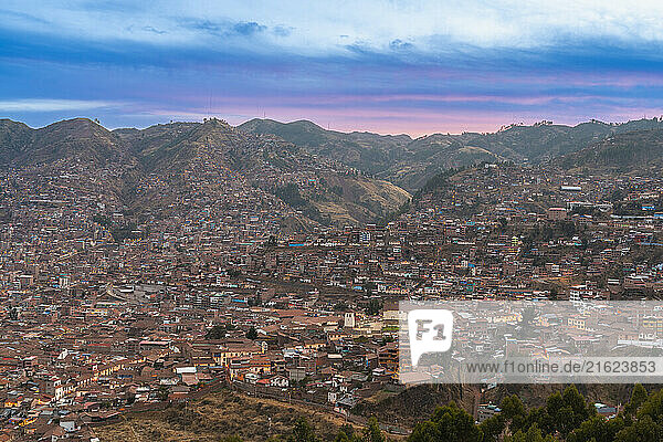 Elevated view of Cusco at dusk  UNESCO World Heritage Site  Cusco Region  Peru  South America