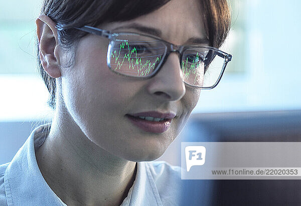 Business women viewing a graph showing company performance