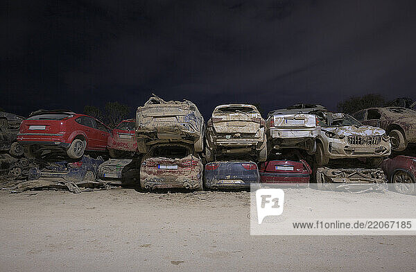 Stacks of car wreckage post floods