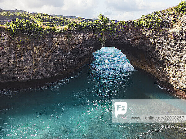Aerial view of rock arch at Broken Beach  Nusa Penida island  Bali  Indonesia