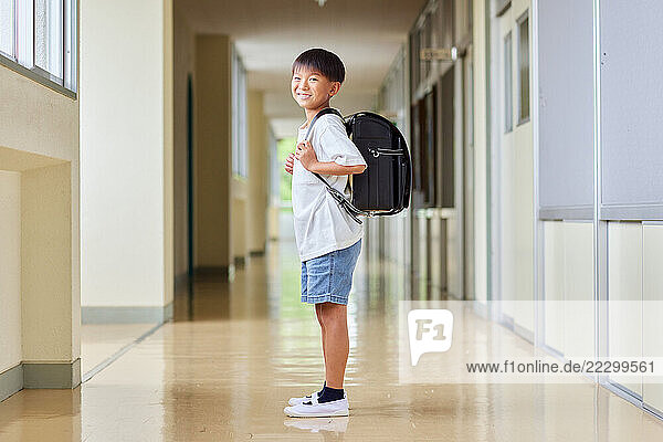 Japanese Kid At School Hallway