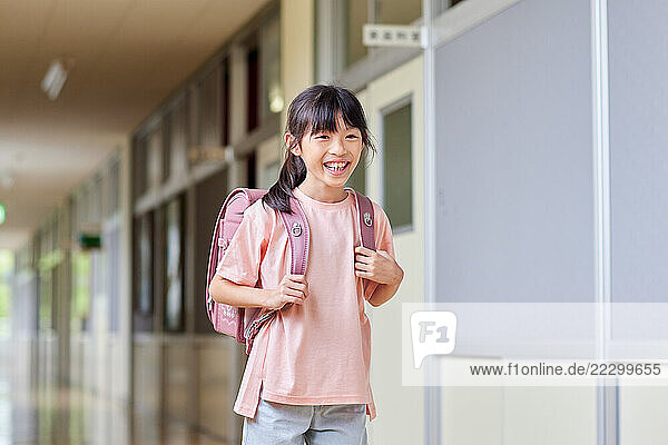 Japanese Kid At School Hallway