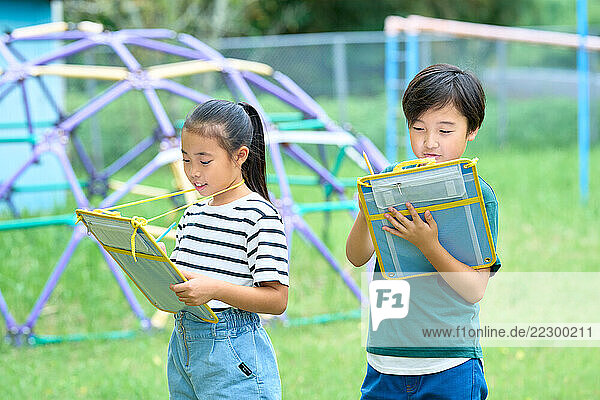 Japanese Kids Studying Outside