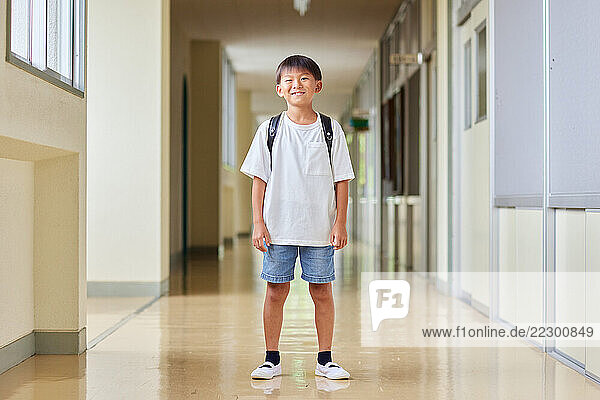 Japanese Kid At School Hallway