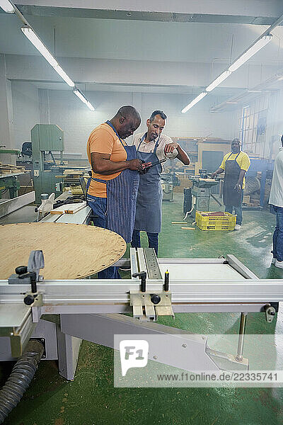 Visually impaired men in wood shop