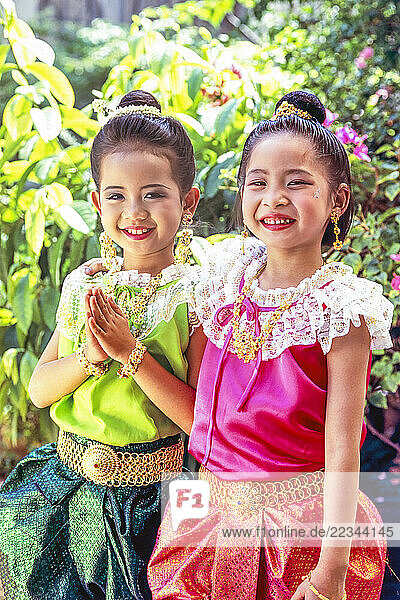 Young girls dressed for Loy Krathong festival in Bangkok; Bangkok  Thailand