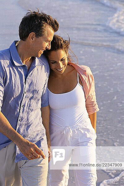 Couple Walking on Beach
