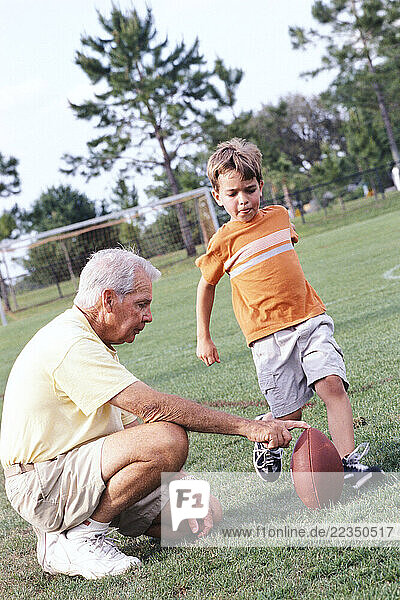 Family Playing Football