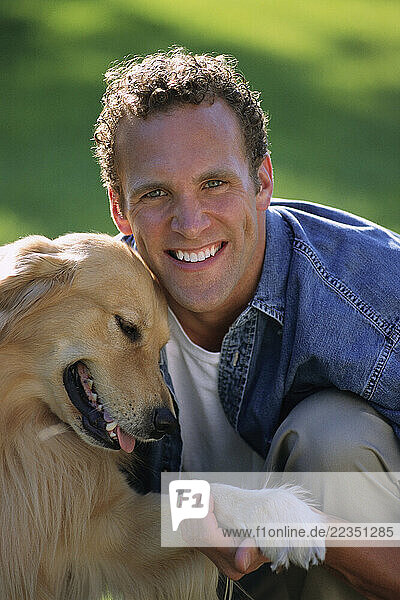 Portrait of Man with Dog Outdoors