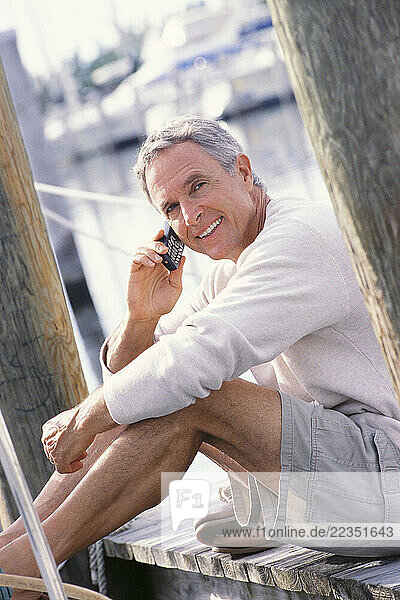 Man Using Cellular Phone