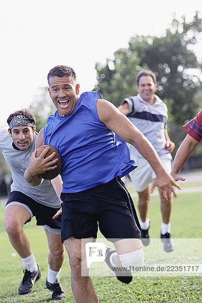 Men Playing Football