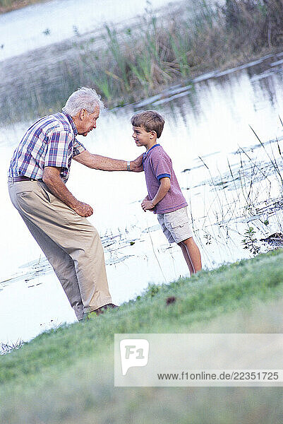Grandfather Talking to Grandson