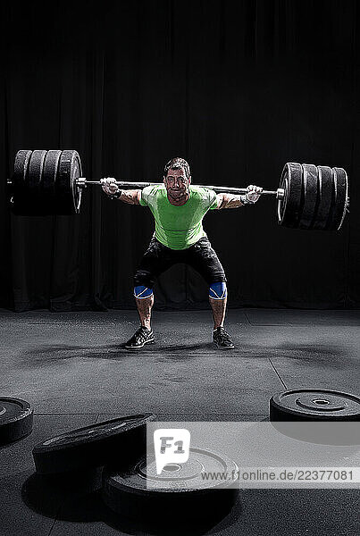 Del Lafountain mid back squat at the CrossFit gym in South Lake Tahoe  California.