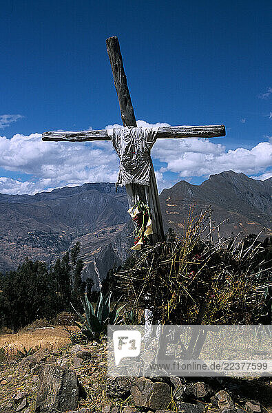 A cross with clothes from the deceased marked the site of one fatality on this particular switchback.