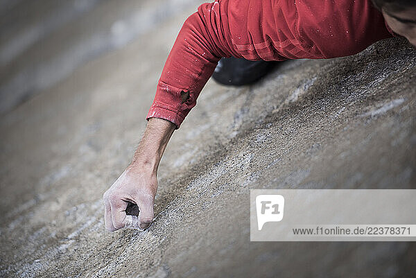 Kevin Jorgeson curls his fingers on top of a thin granite edge in what climbers call a crimp hand position. Crimping comes with a higher risk of injury due to the extreme force placed on the fingers annular ligaments. After spending 19 days on the wall  Tommy Caldwell and Kevin Jorgeson reached the summit of El Capitan in Yosemite National Park for their historic first free ascent of the Dawn Wall (VI 5.14d) on January 14  2015.