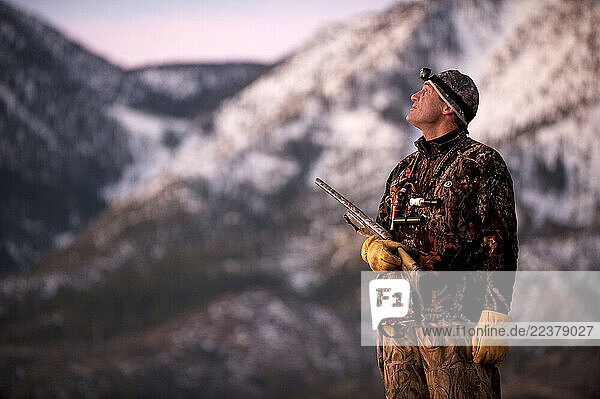 Brad Jackson keeps his eyes on the sky in search of geese in the early morning in Carson City  NV.