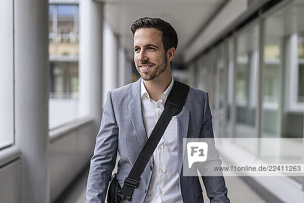 Confident businessman in the city on the go