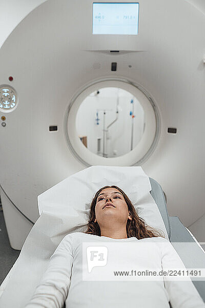 Patient undergoing an MRI scan in a medical clinic
