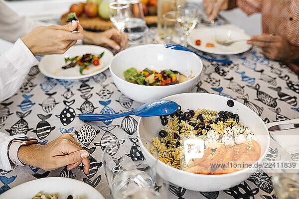 Close-up of friends having healthy lunch together
