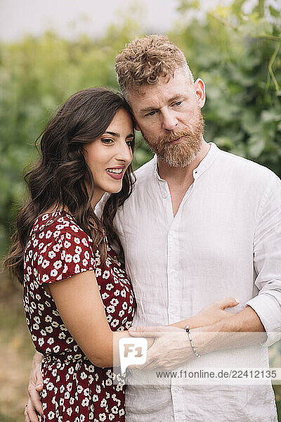Portrait of couple in love in the vineyards