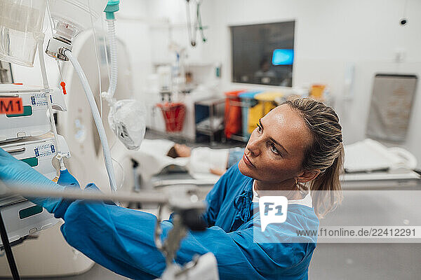 Doctor consulting with a patient in an emergency room setting