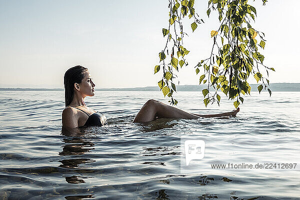 Young woman bathing in Lake Starnberg  Germany