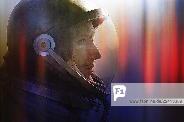 Astronaut in a futuristic space helmet with neon reflections